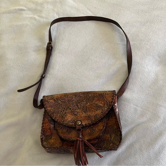 Patricia Nash
Beaumont Flap Burnished Tooled Crossbody, EUC - Picture 3 of 12